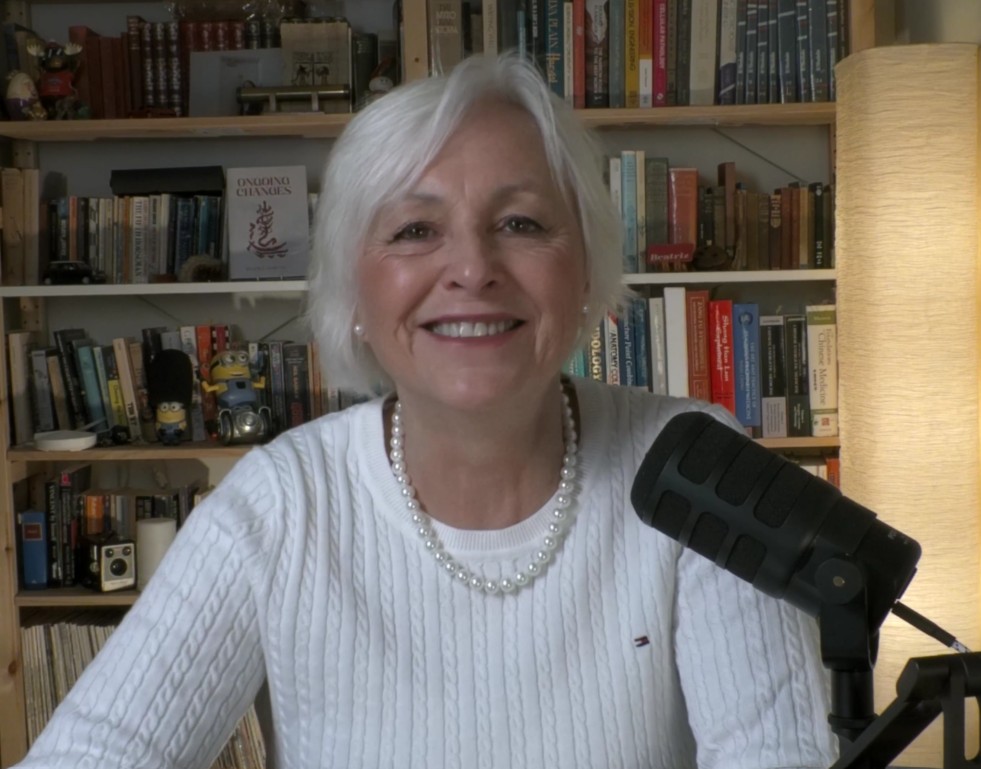 Dr. Beatriz Martini, Doctor of Chinese Medicine, smiling warmly in her study